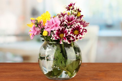 Fresh flowers being arranged by florists